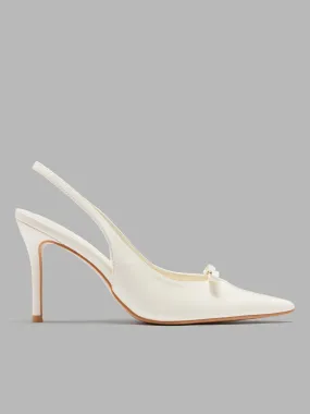 1. Talons à bout pointu en faux cuir