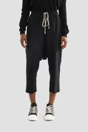 Pantalon noir à fourche basse