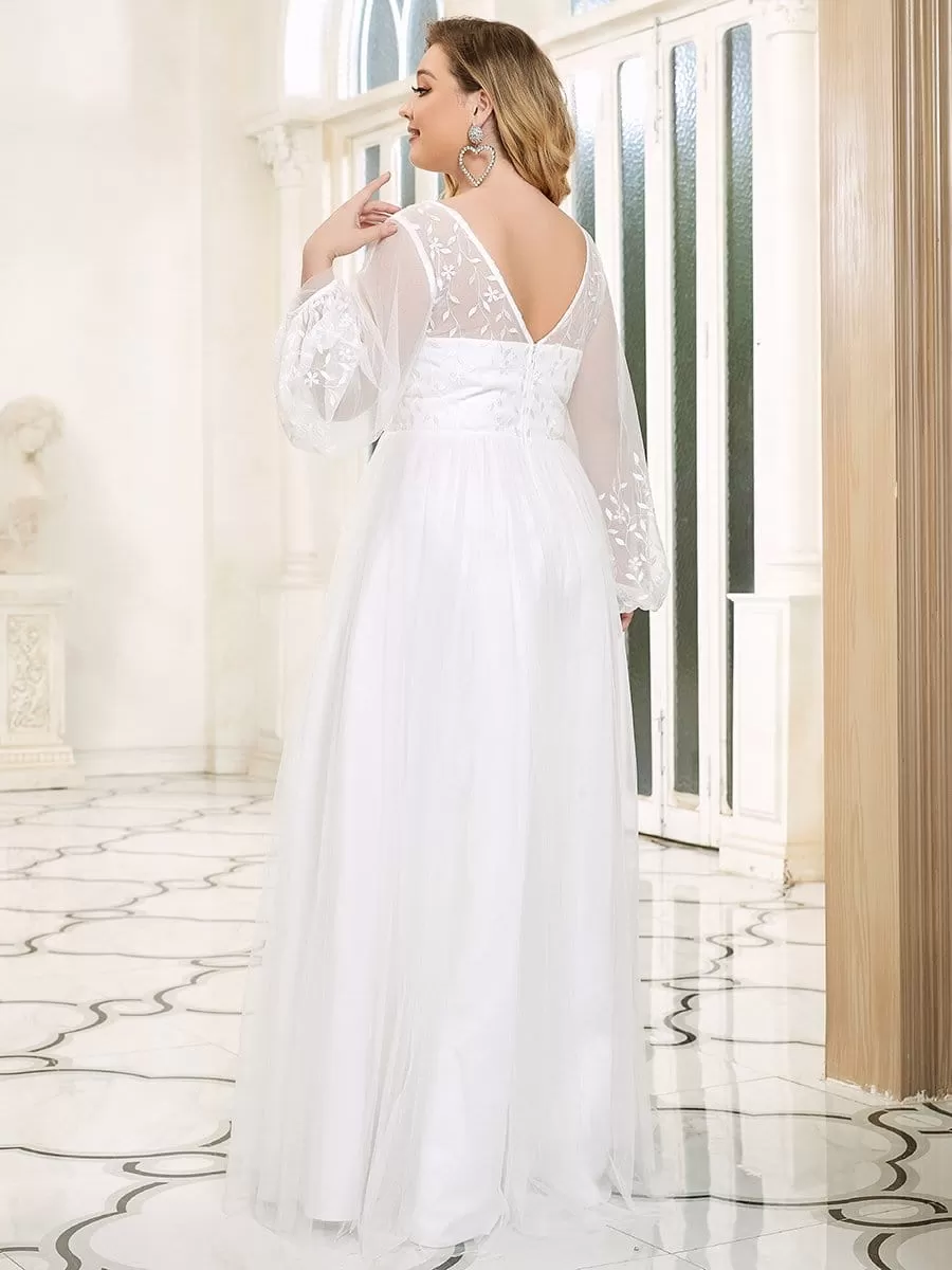 Robe de mariée longueur au sol avec appliques à manches longues