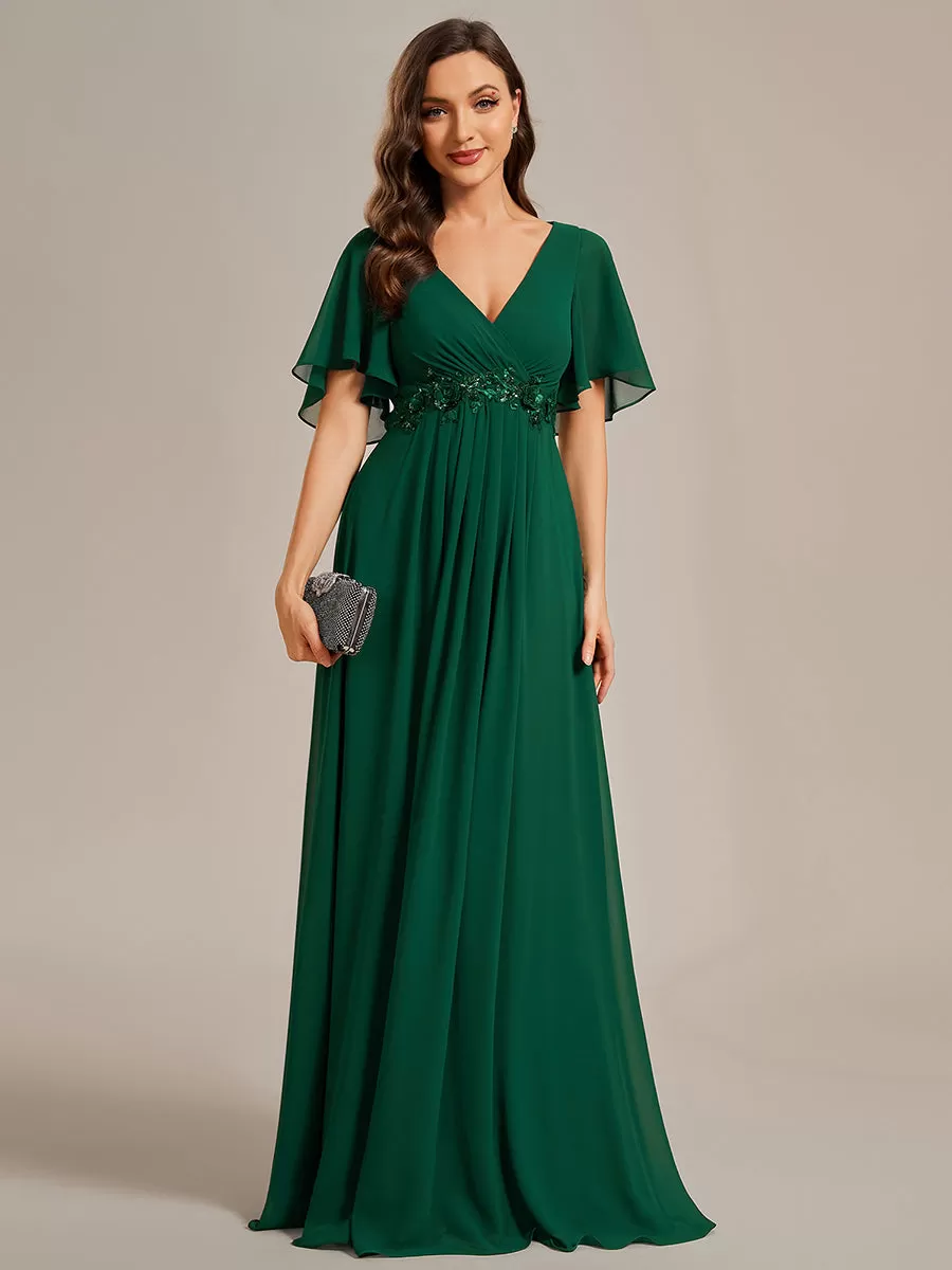 Robe de soirée élégante en mousseline de soie avec manches flottantes