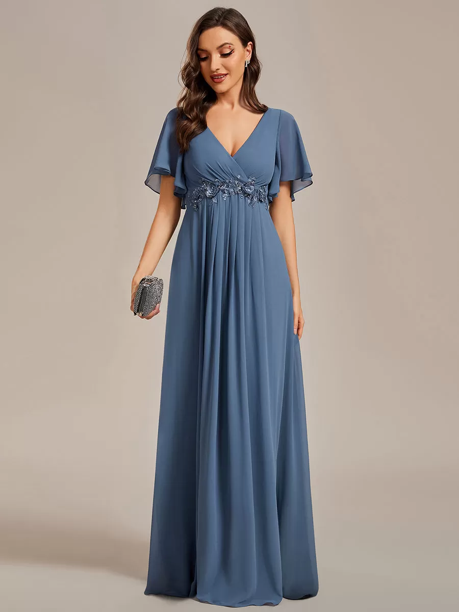 Robe de soirée élégante en mousseline de soie avec manches flottantes